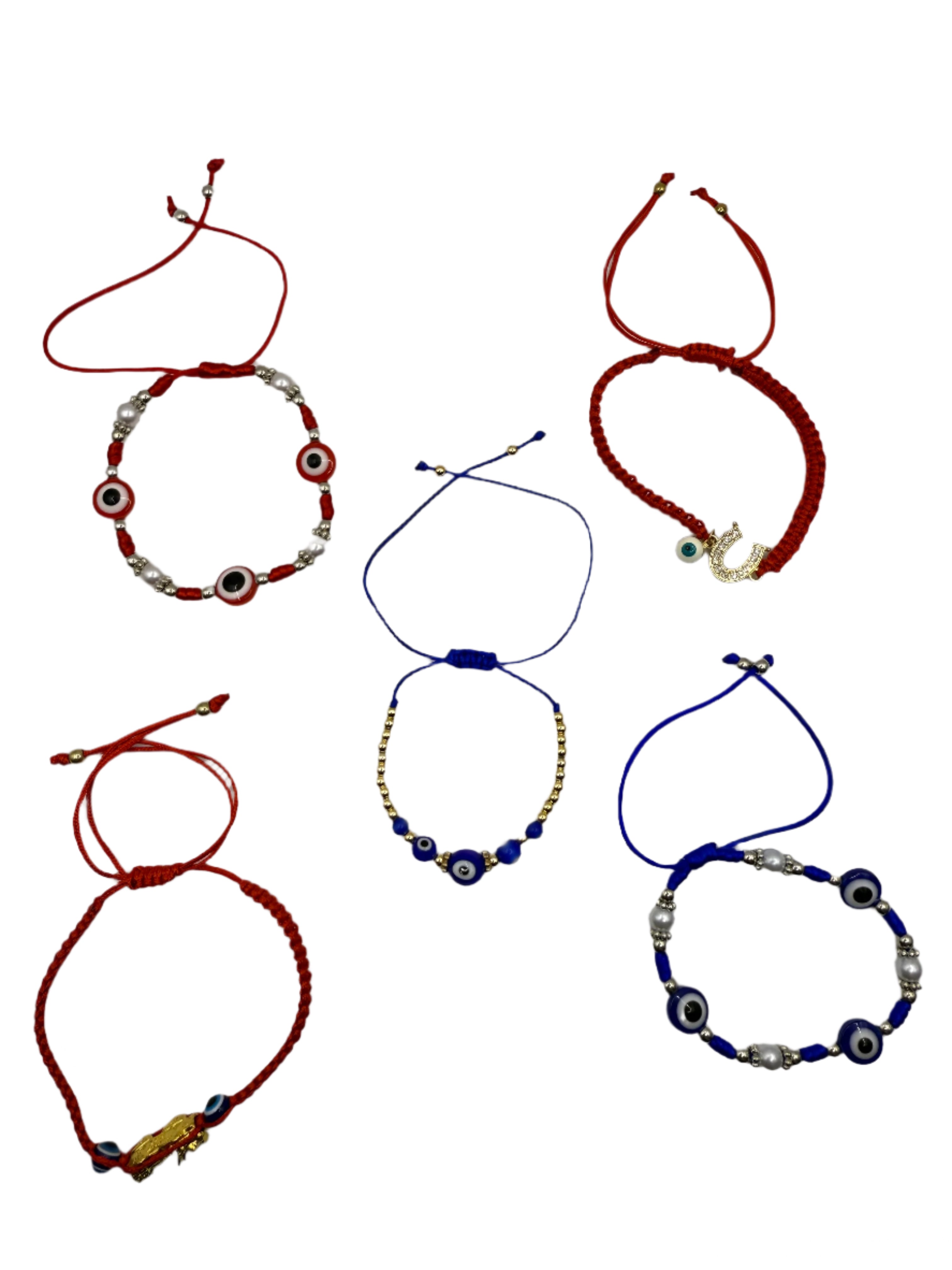 Collection of red, blue, and gold bracelets with eye designs on a white background